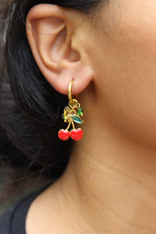 Cherelle Hoop Earrings worn on an ear