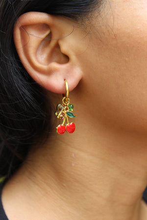 Cherelle Hoop Earrings on an ear