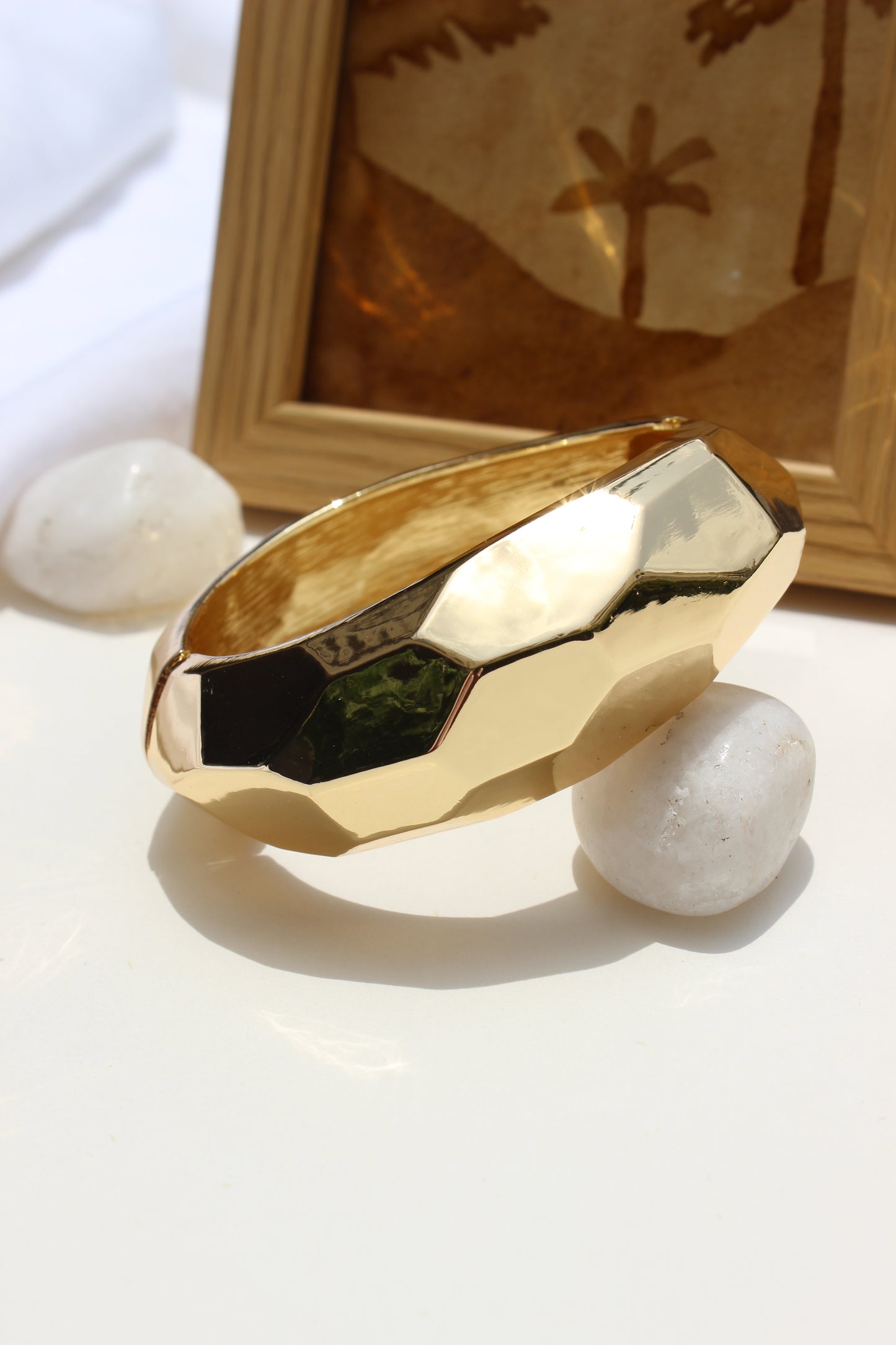 Golden Pause Bracelet on a white surface