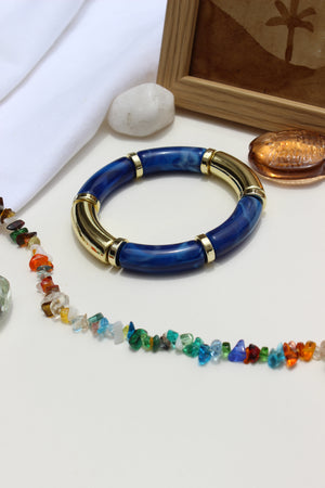 Colorhug Bangle Bracelets on a white surface