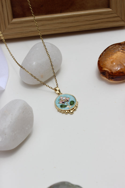 Decorative Skyflower Pendant Necklace on a white surface