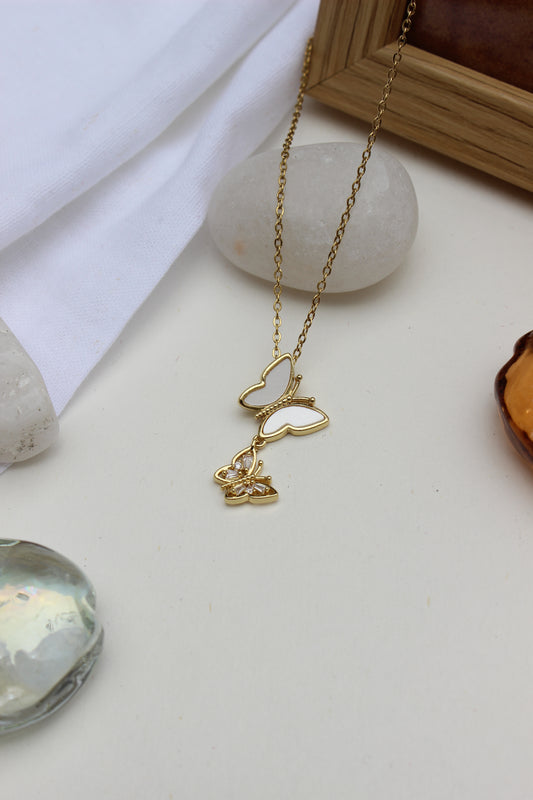 Clarisee Pendant Necklace on a light surface