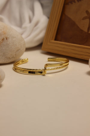 Ouro Cuff Bracelet on a white background
