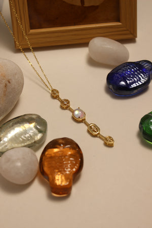 Seraphine Necklace on a neutral background