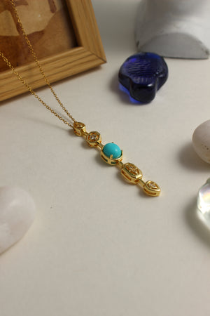 Medina Moon Necklace on a white surface