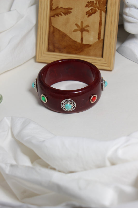 Regalia Bangle on a white surface