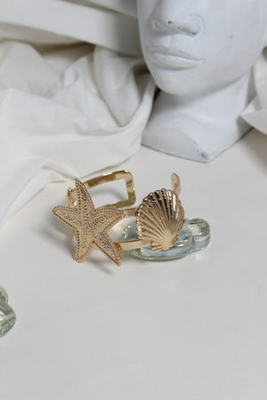 Golden Tide Cuff Bracelet on a light surface