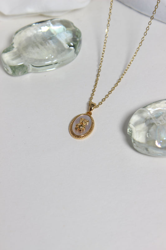 Cuddle Pearl Pendant Necklace on a white background