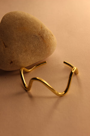 Drift Cuff Bracelet on a beige background