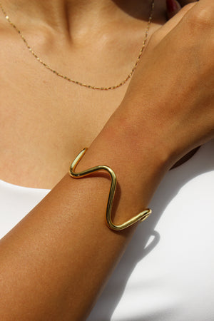 Drift Cuff Bracelet on a wrist with a neutral background