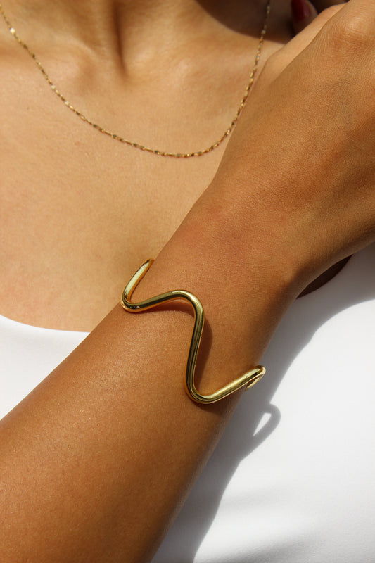 Drift Cuff Bracelet on a wrist with a neutral background