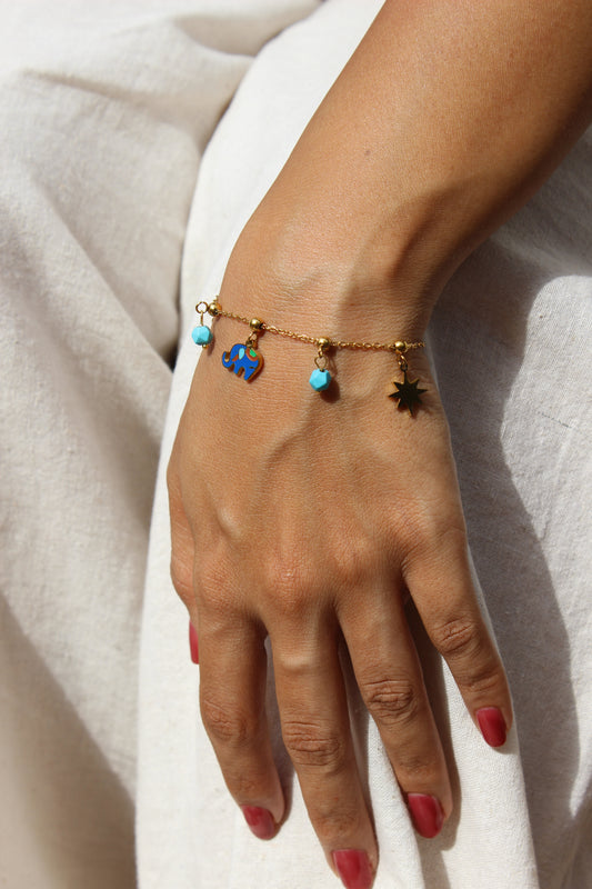 Wishkeeper Charms Bracelet worn on a woman’s wrist, showcasing stylish, customizable jewelry for everyday fashion