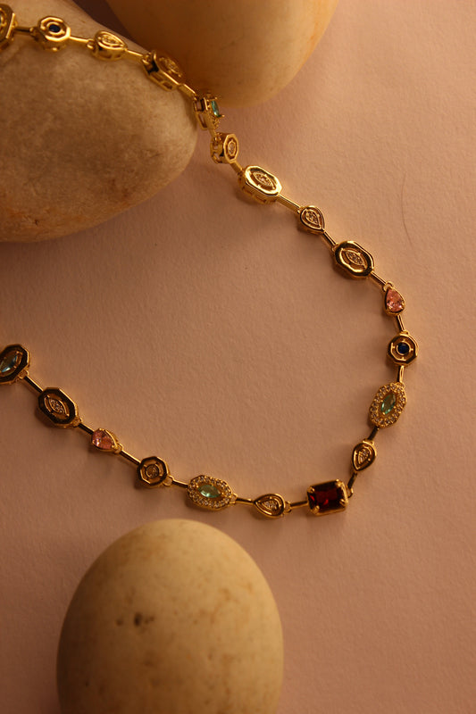 Solstice Waltz Necklace on a beige background