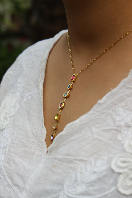 Gemline Necklace on a model wearing a white top