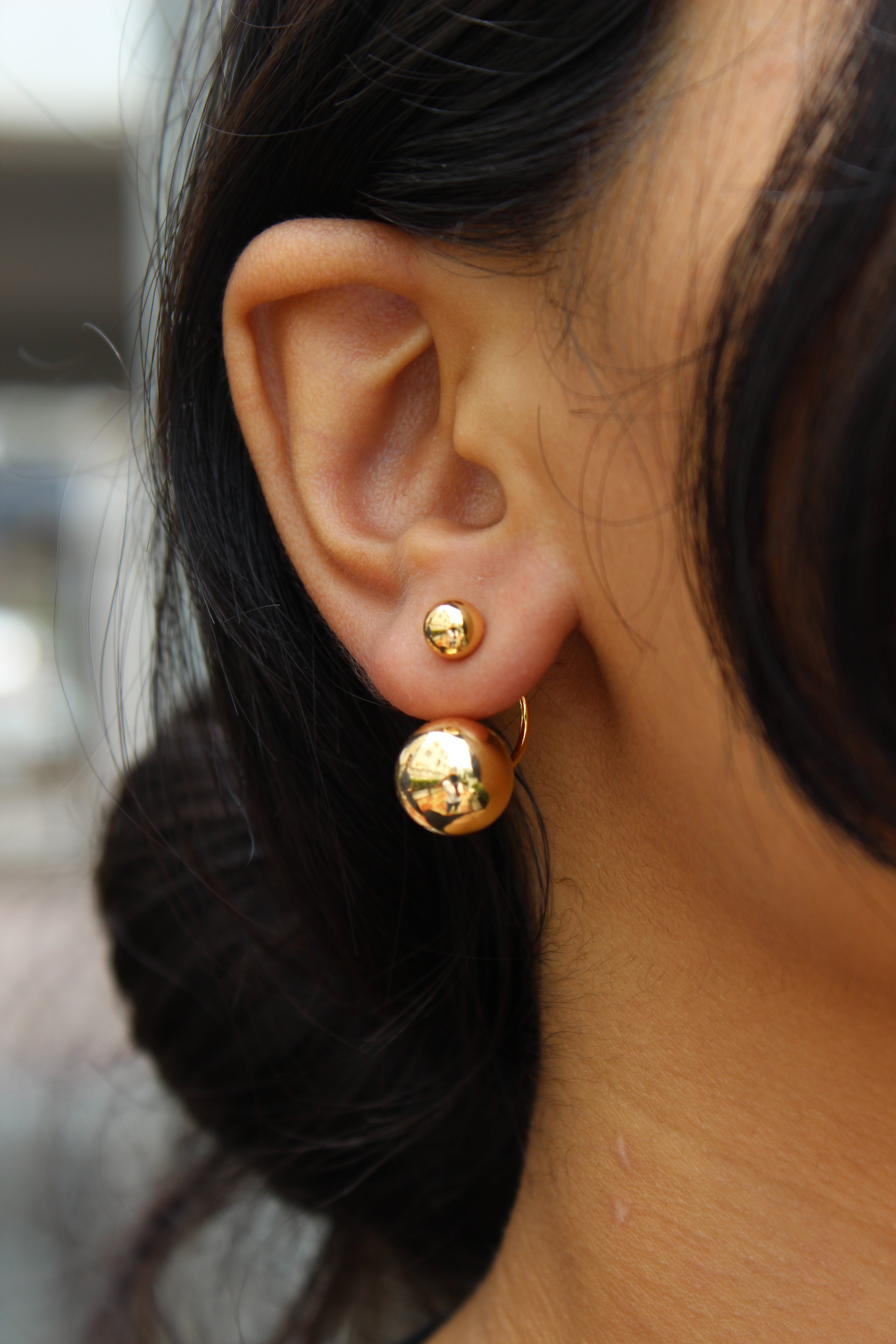 Close-up of an ear wearing a Velisse Stud Earrings 