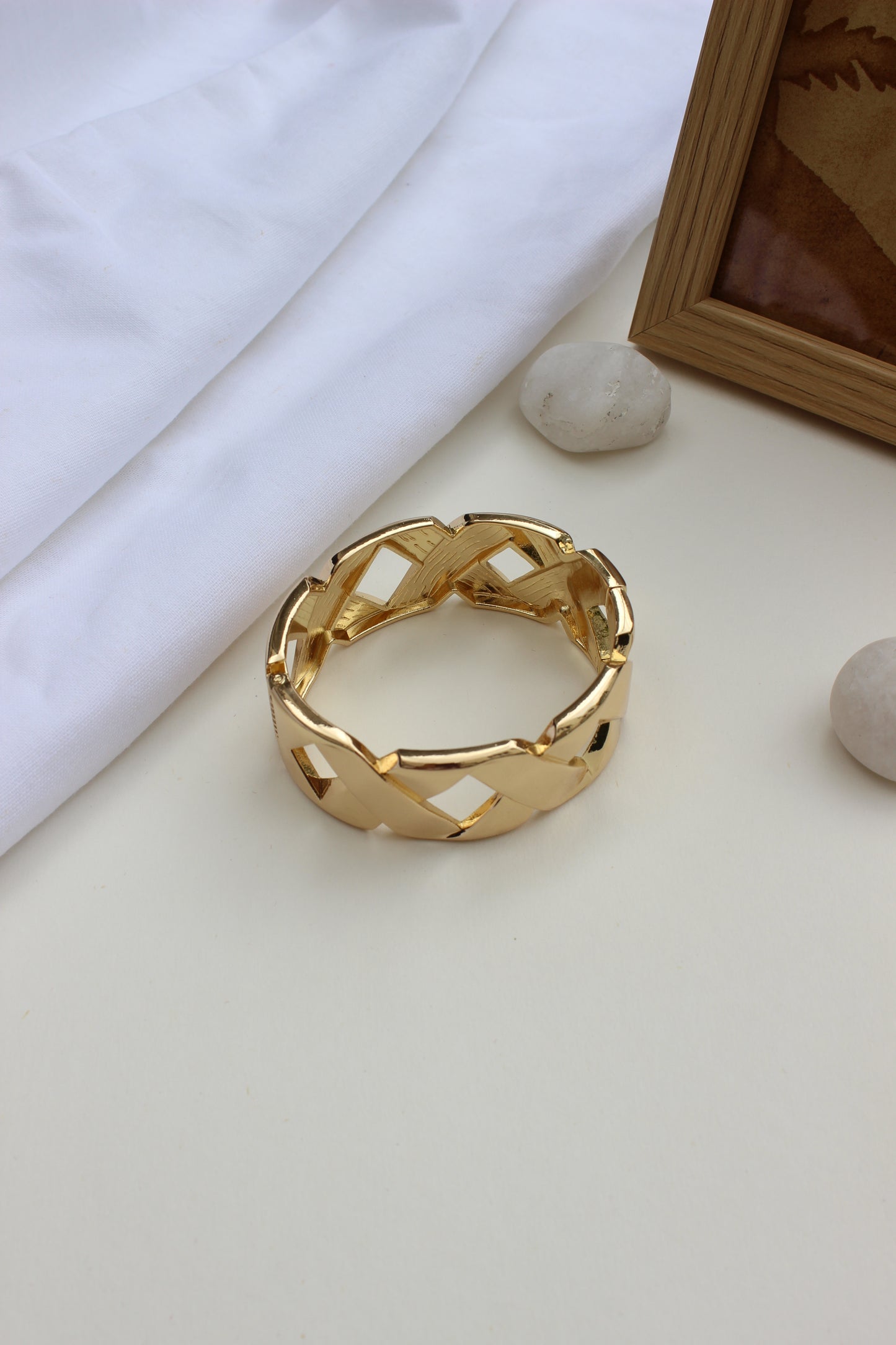 Stellar Thread Bracelet on a white surface with a neutral background