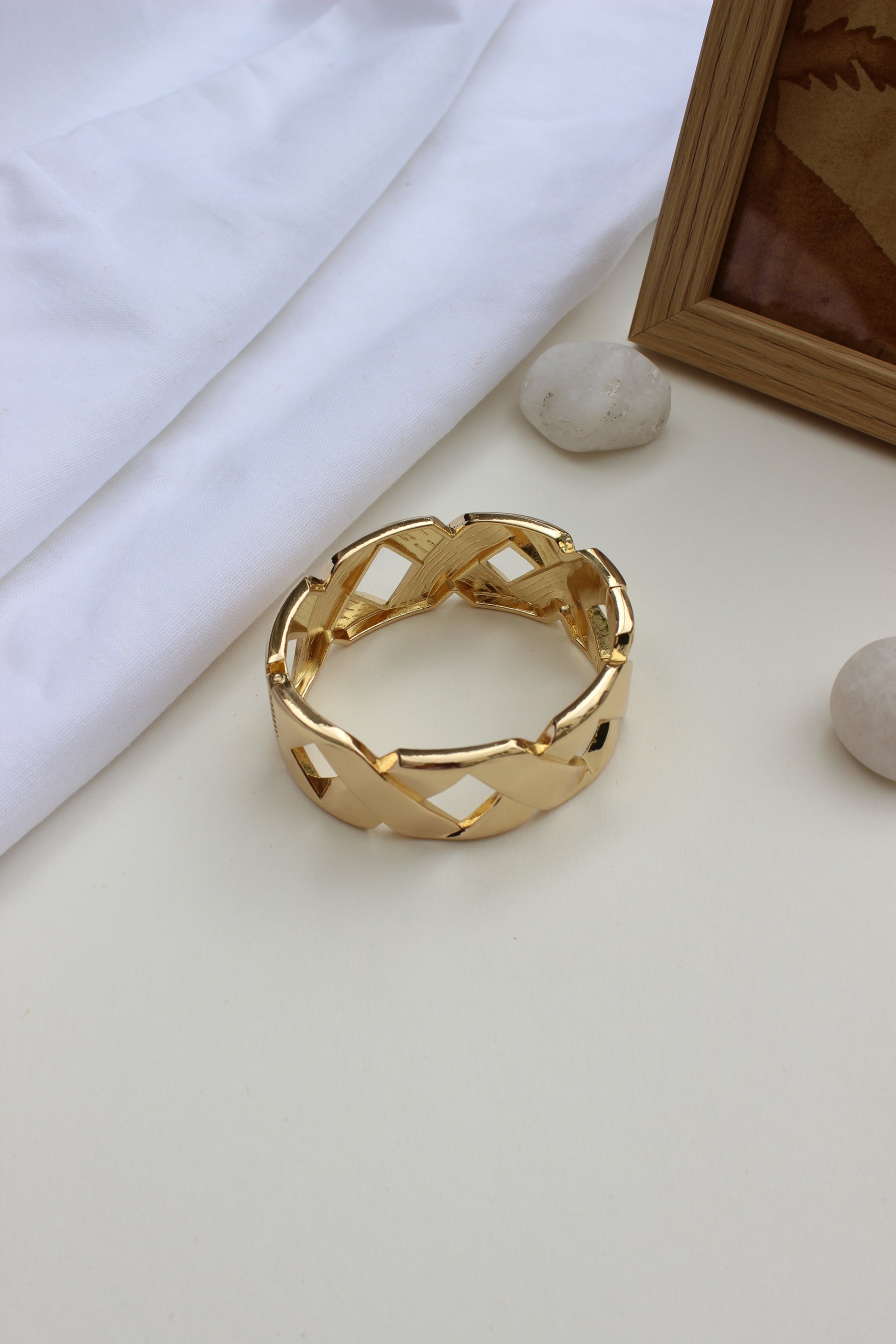 Stellar Thread Bracelet on a white surface with a neutral background
