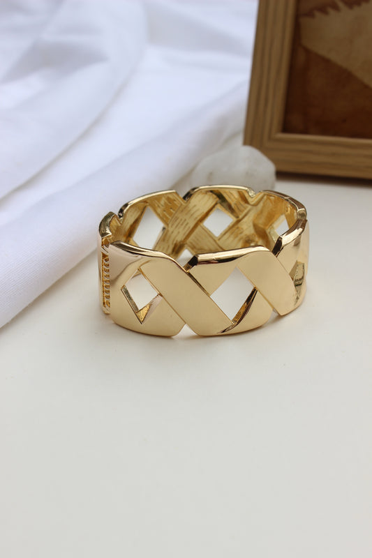 Stellar Thread Bracelet on a white surface with a blurred background