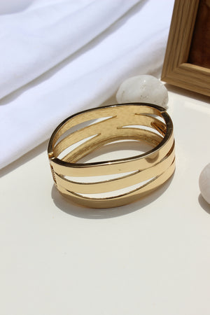 Tide Warp Bracelet on a white surface with a soft focus background