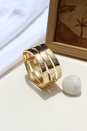 Tide Warp Bracelet with a textured band on a light background