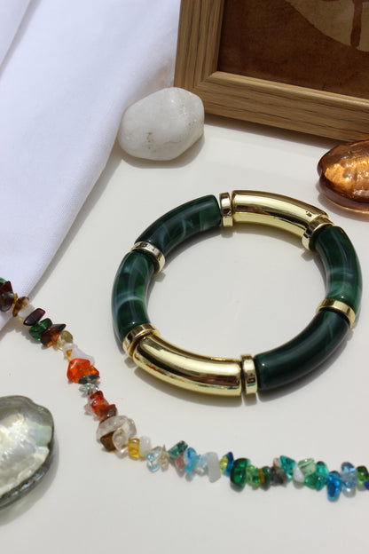 Amazonia Bangle Bracelets on a light surface