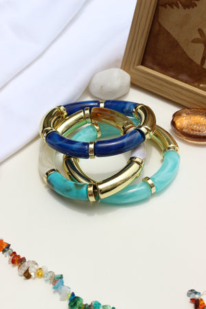 Colorhug Bangle Bracelets on a light background