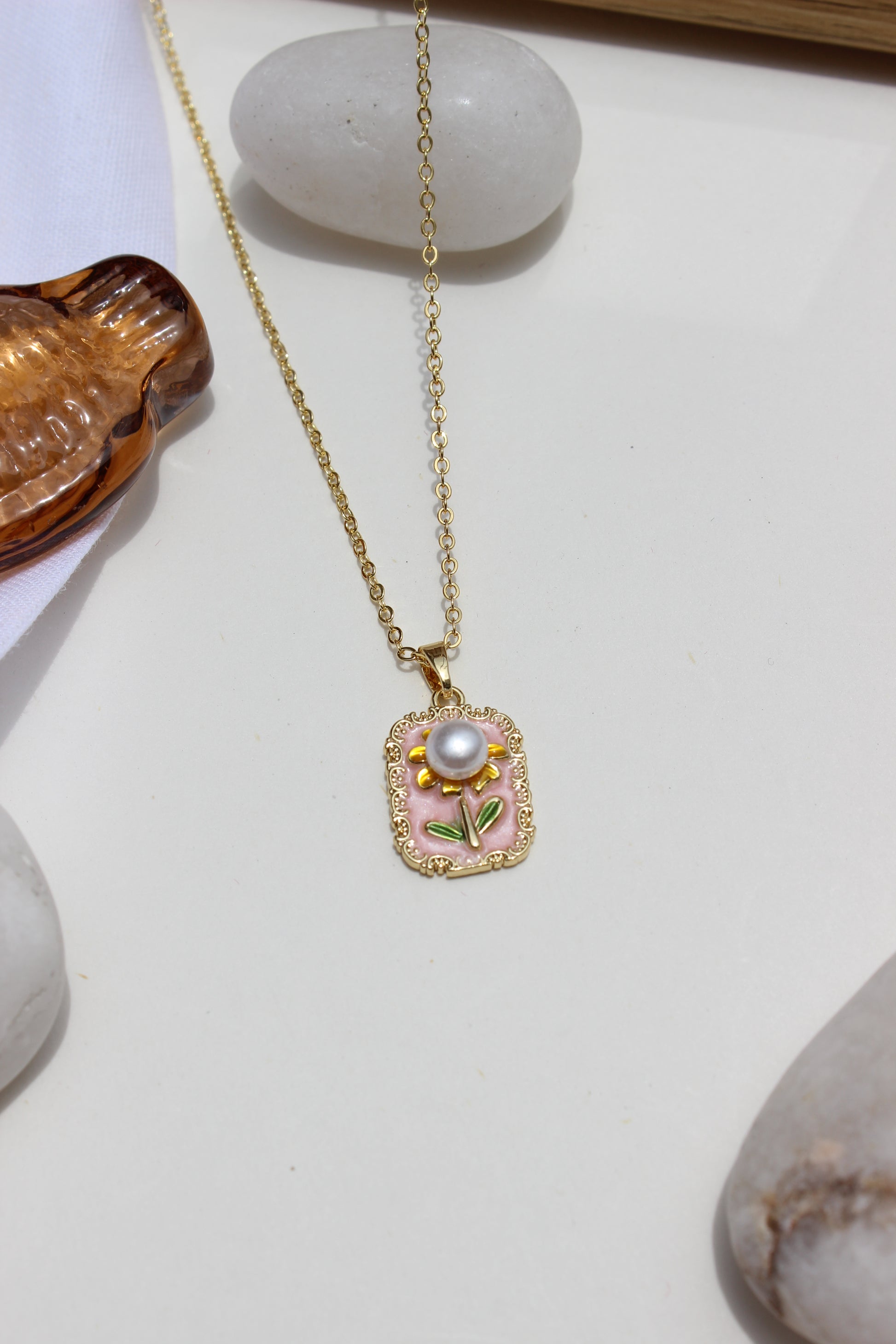 Petal of the Ocean Pendant Necklace on a light background