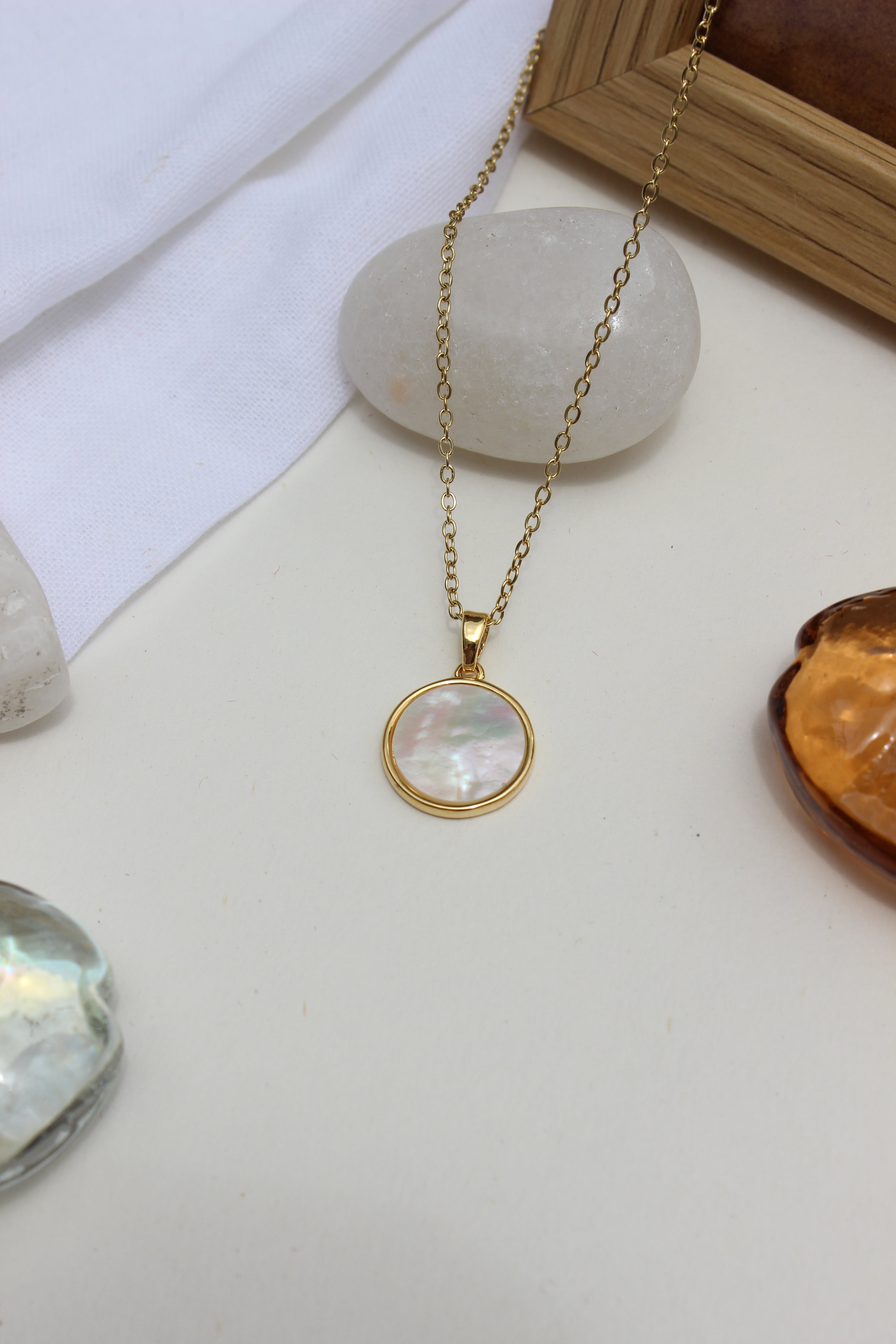 Melted Calm Pendant Necklace on a light surface