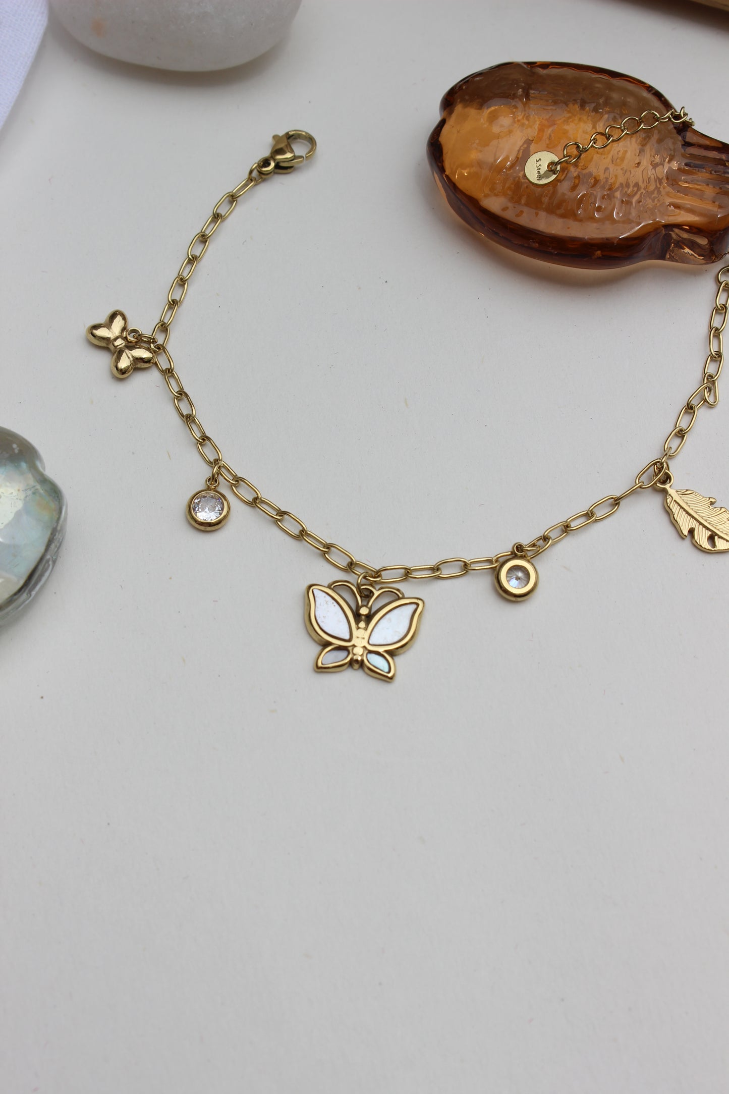 Honey & Moonlight Charm Bracelet on a light gray background