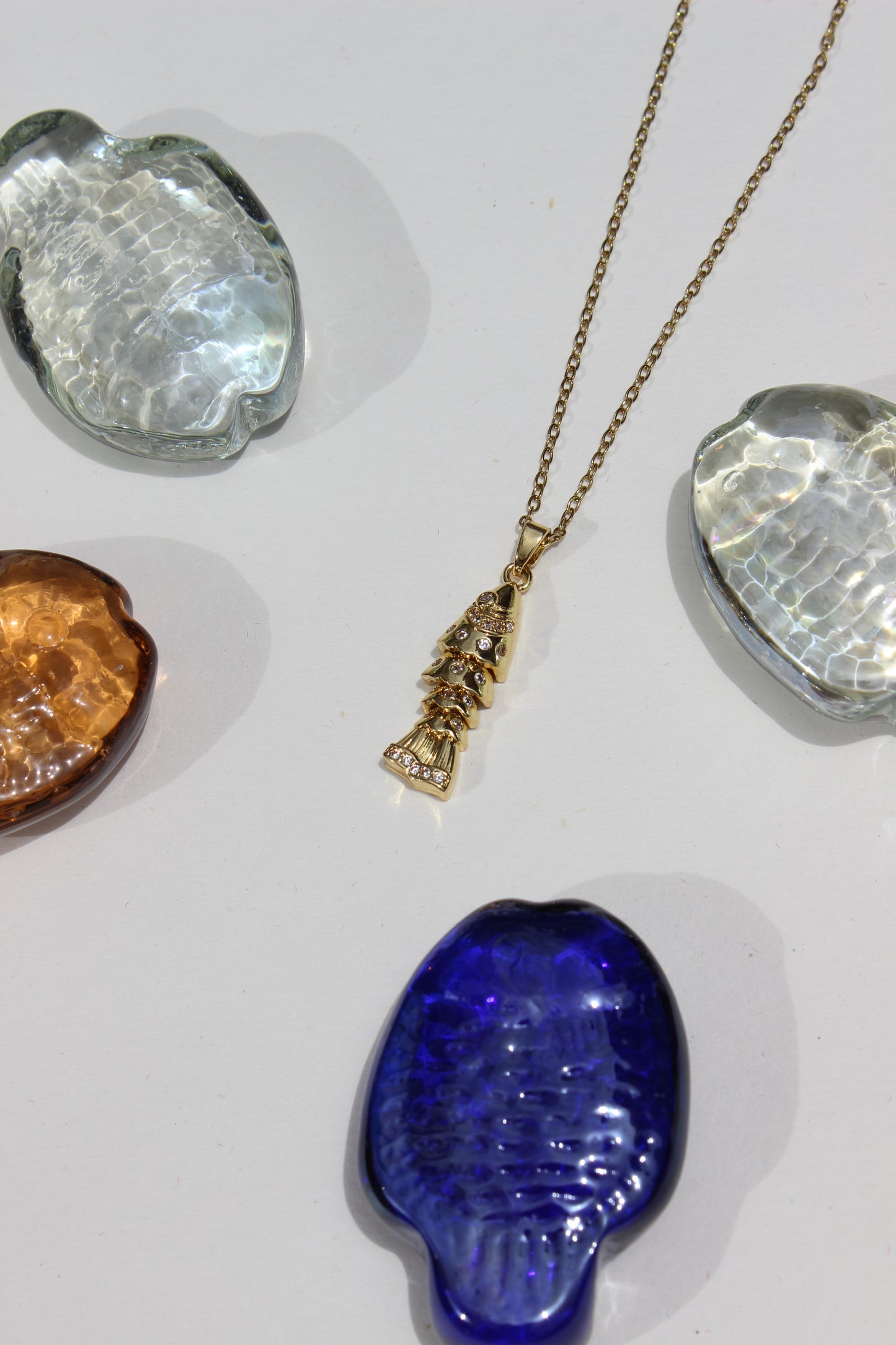 Ripple Tail Pendant Necklace on a white background