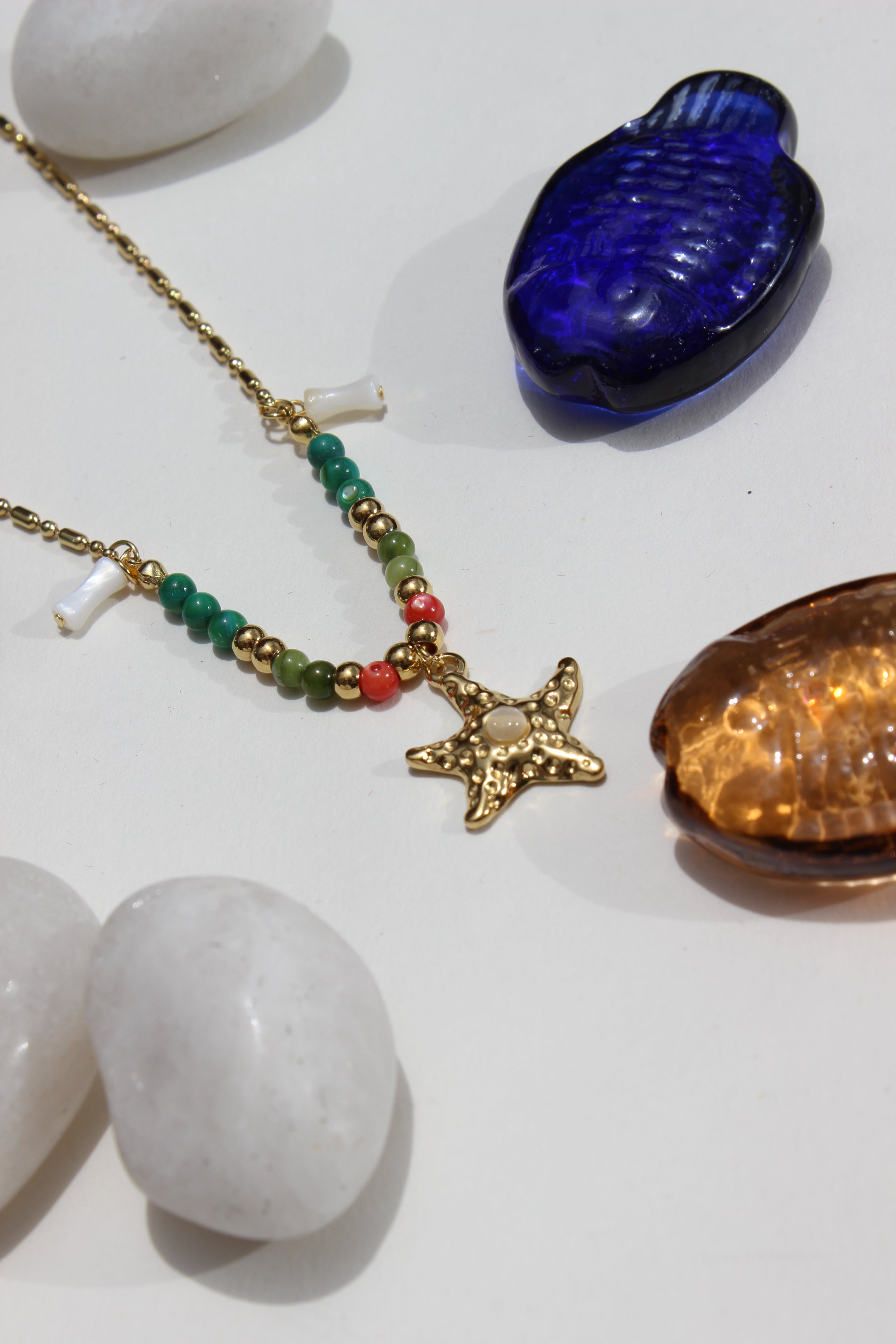 Star of Shore Necklace on a white surface