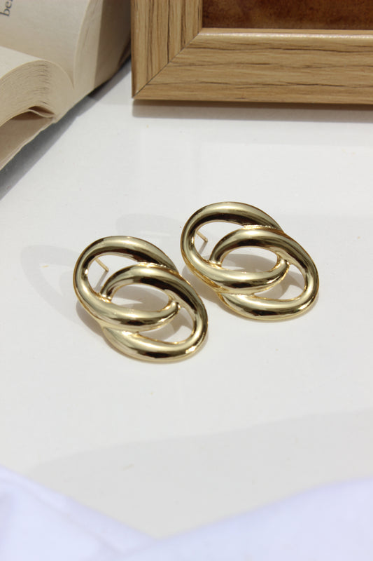 Daily Gleam Earrings on a white surface 