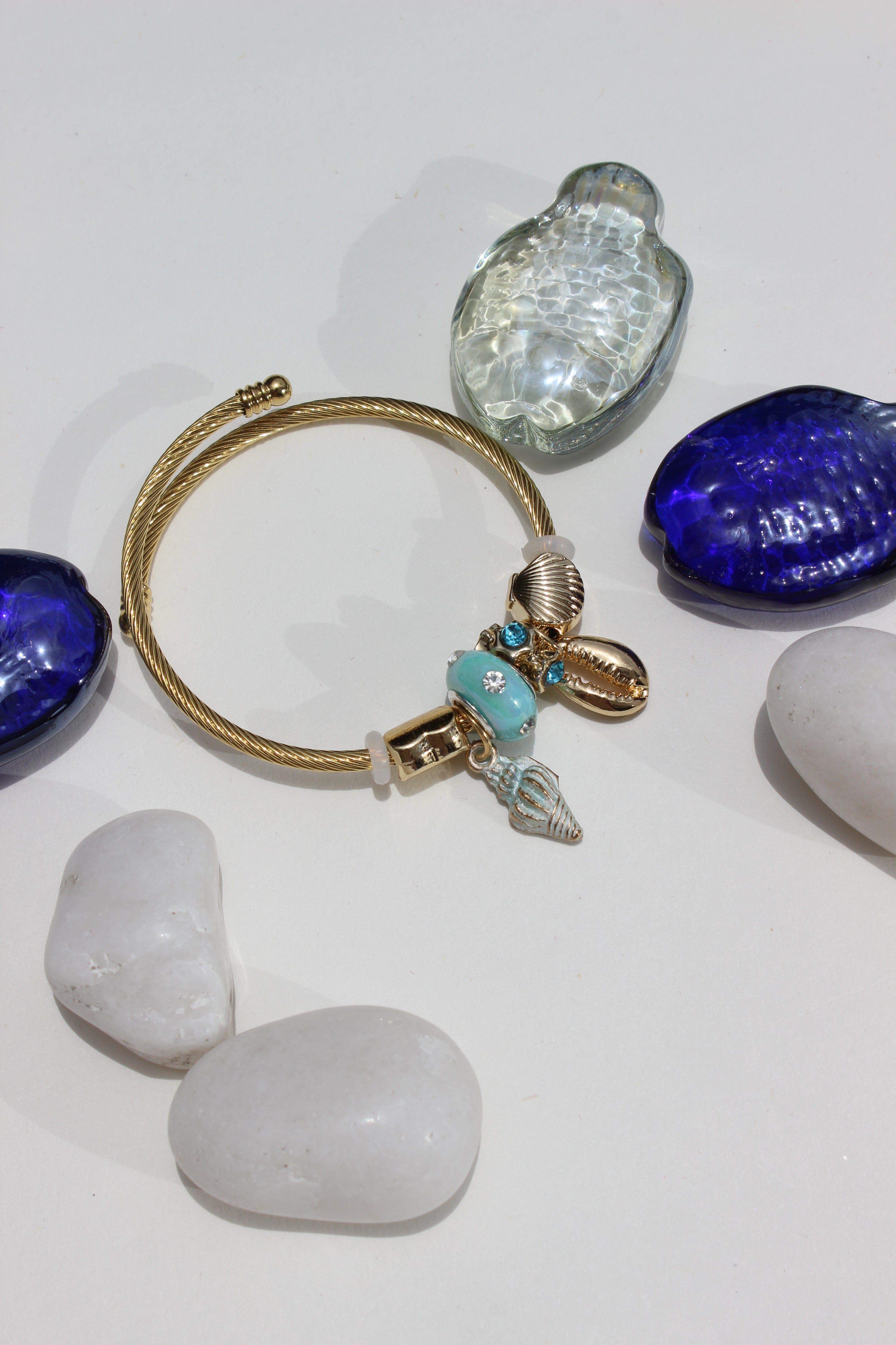 Celestide Charms Bracelet on a white background