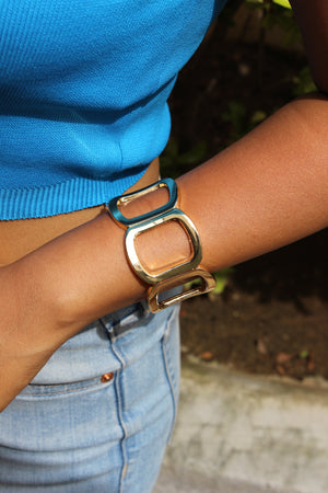 Close-up of a wrist wearing a Echo Ridge Bracelet with a blurred background