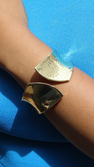 Sculpted Quiet Bracelet on a wrist with a blue background