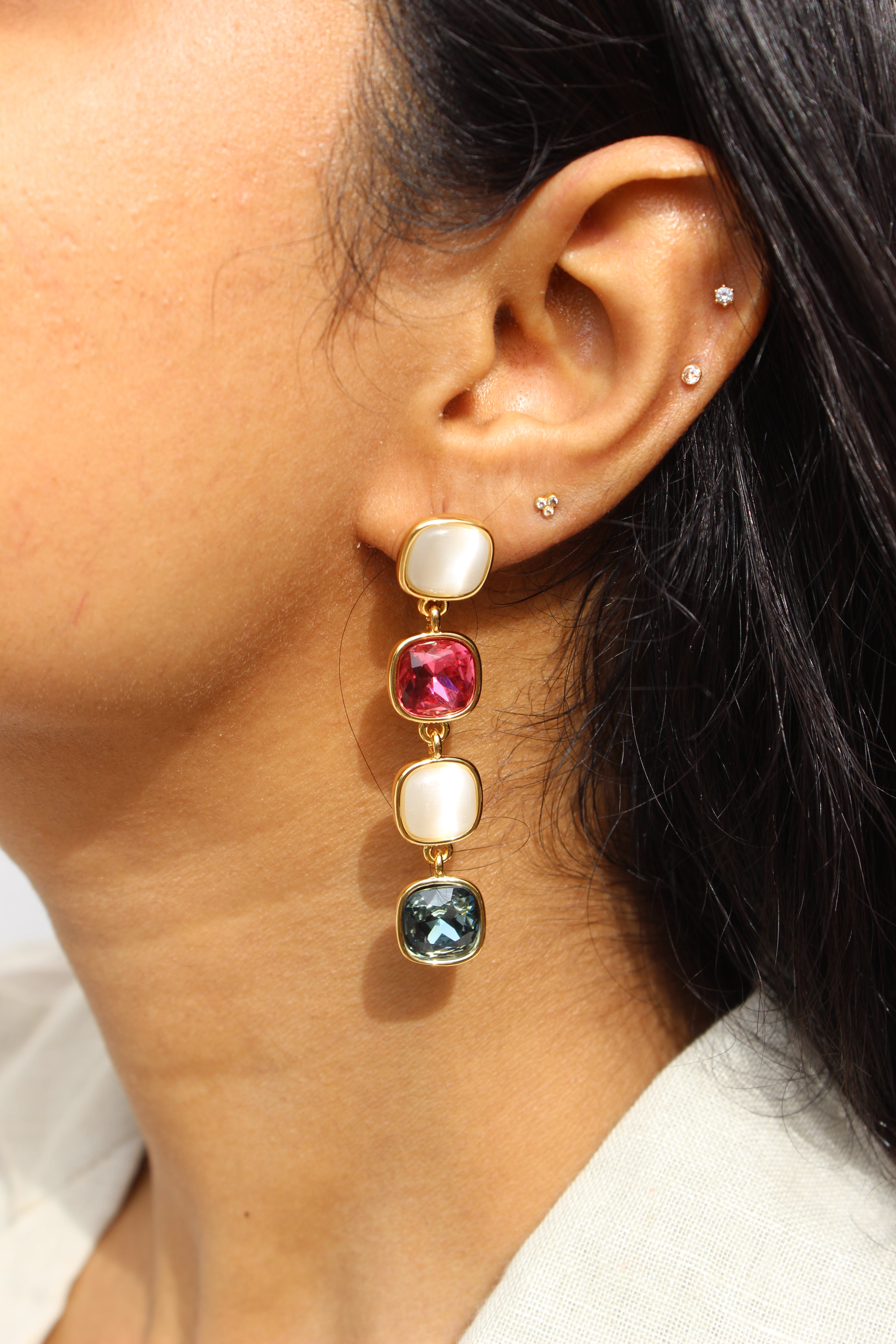 Close-up of model wearing aSkyfire Gleam Earrings 