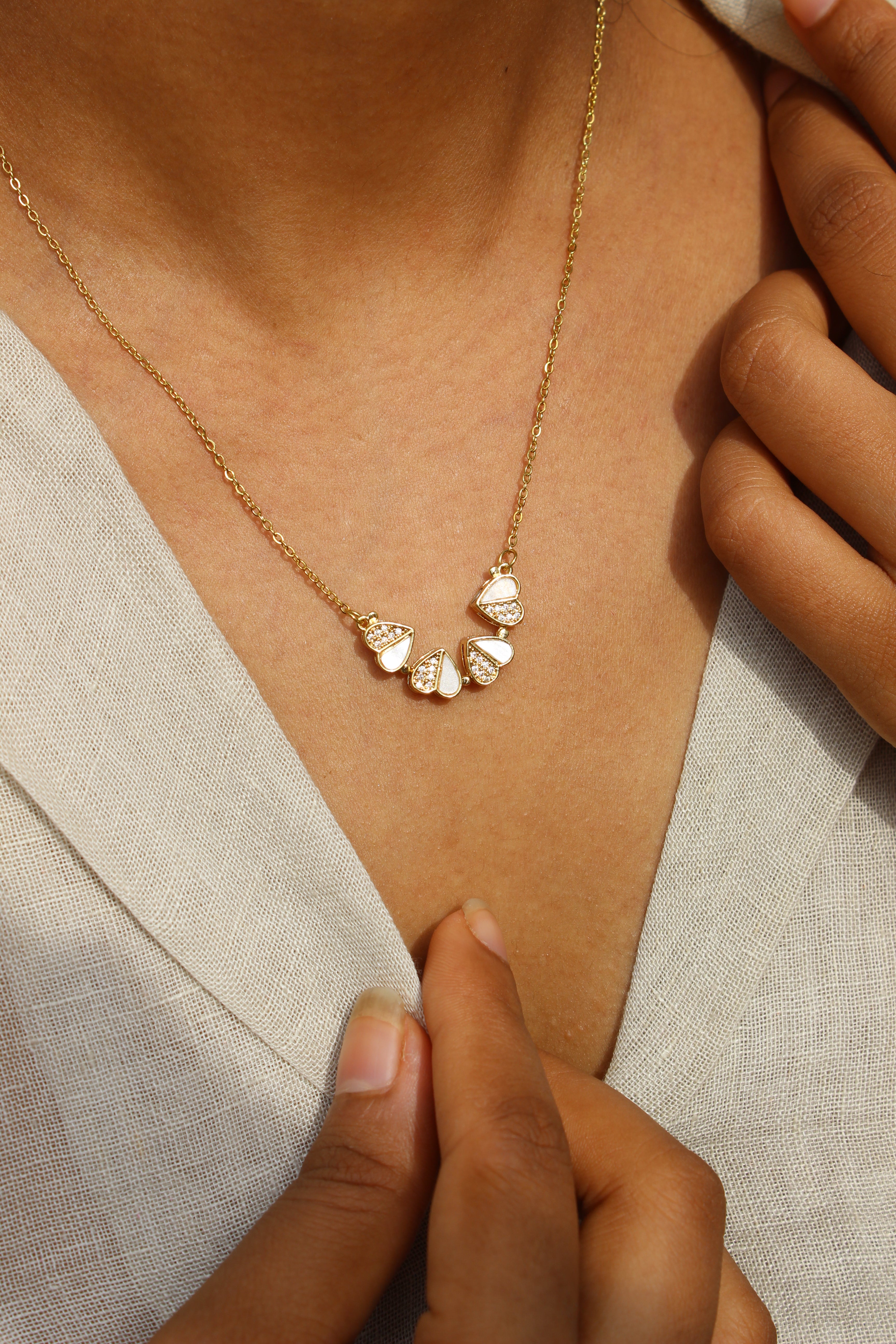 Oyster Petal Pendant Necklace on a model's neck