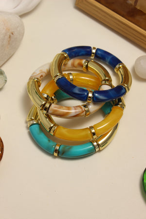 Seaglass Bangle Bracelets on a light surface