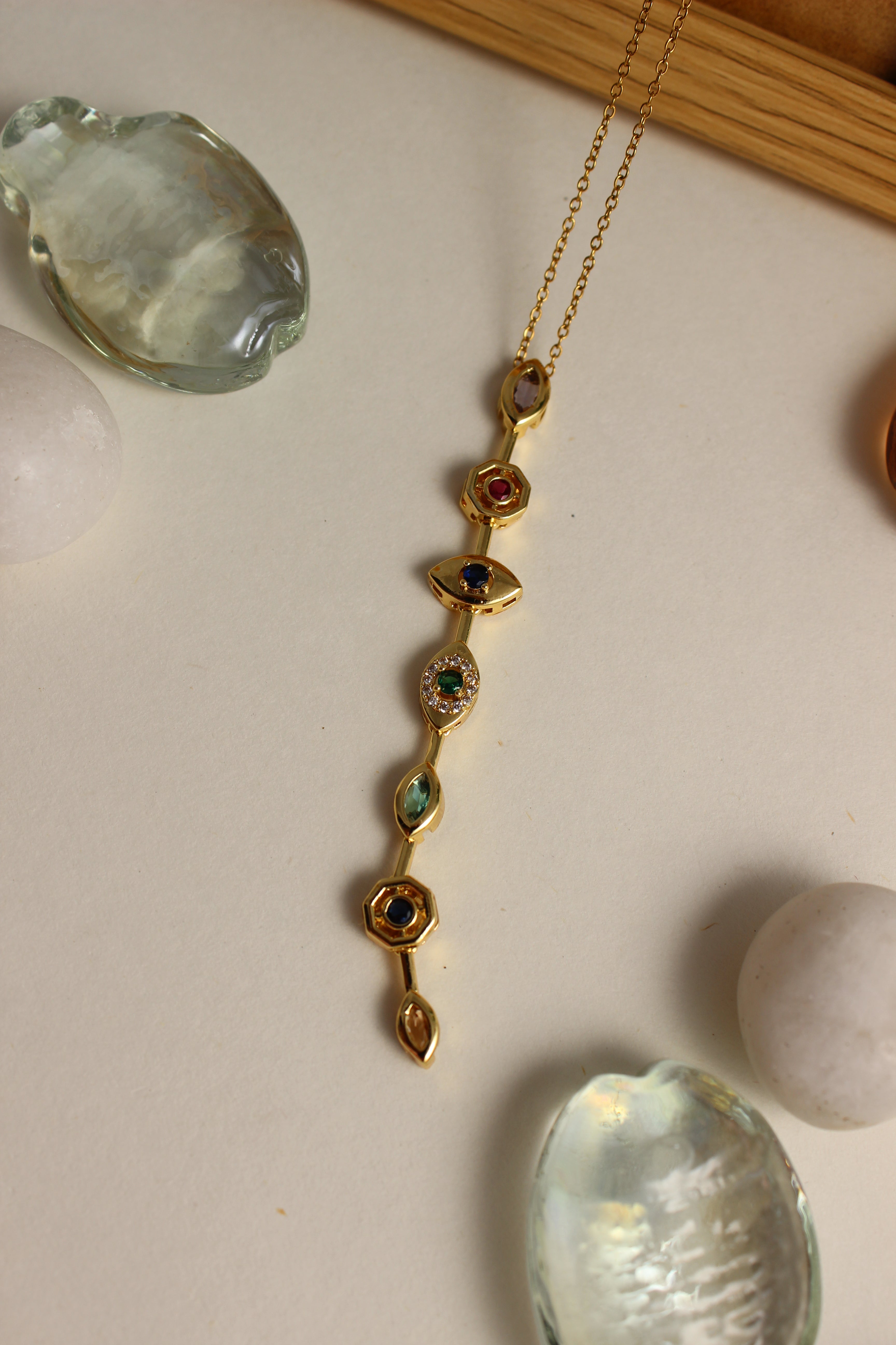 Lustre Pour Necklace on a light surface