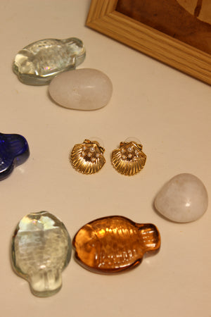 Sunset in Bloom Stud Earrings on a flat surface