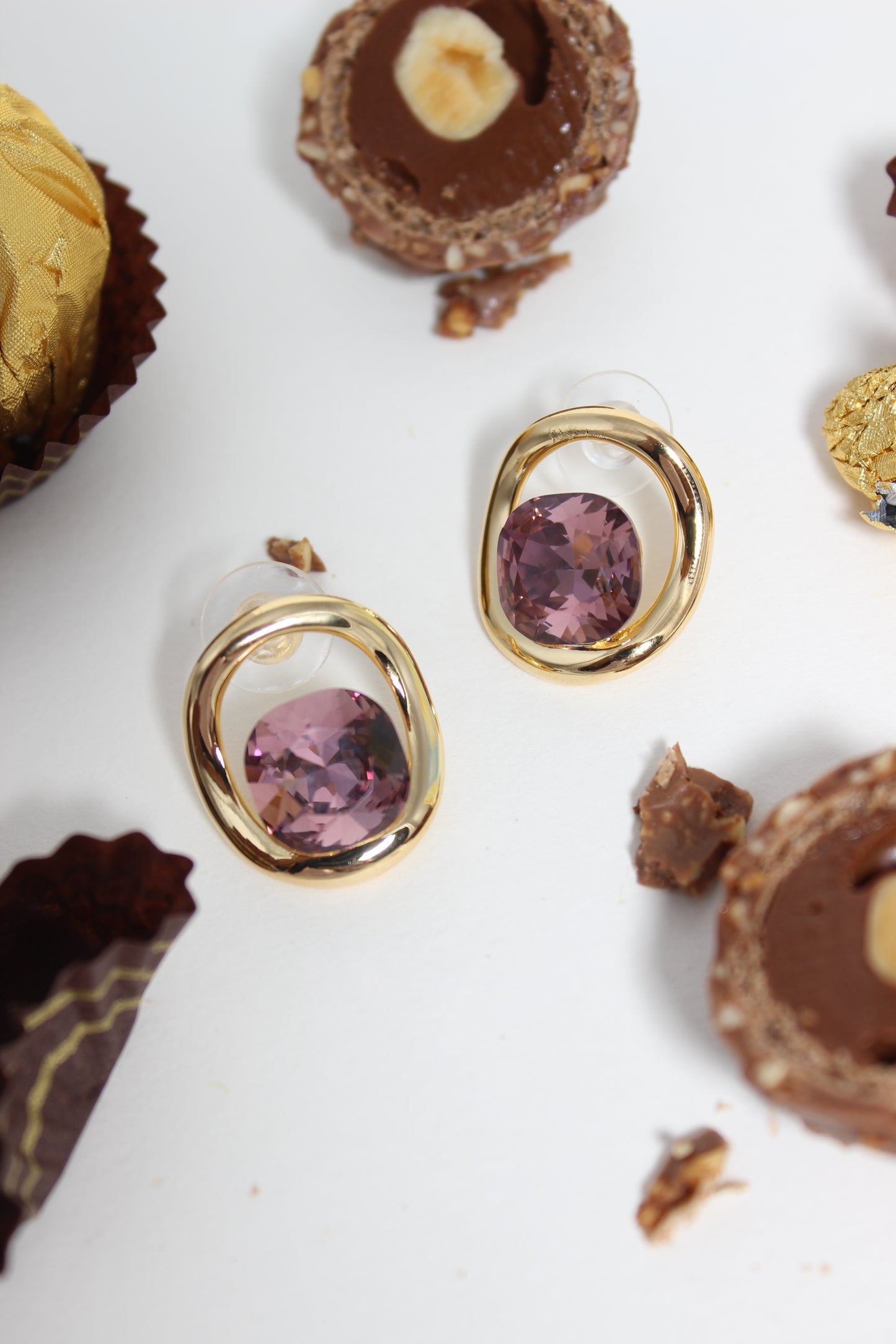 Sable Soleil Earrings on a white background with chocolate truffles