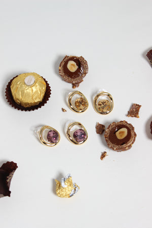 Golden Truffle Earrings on a white surface