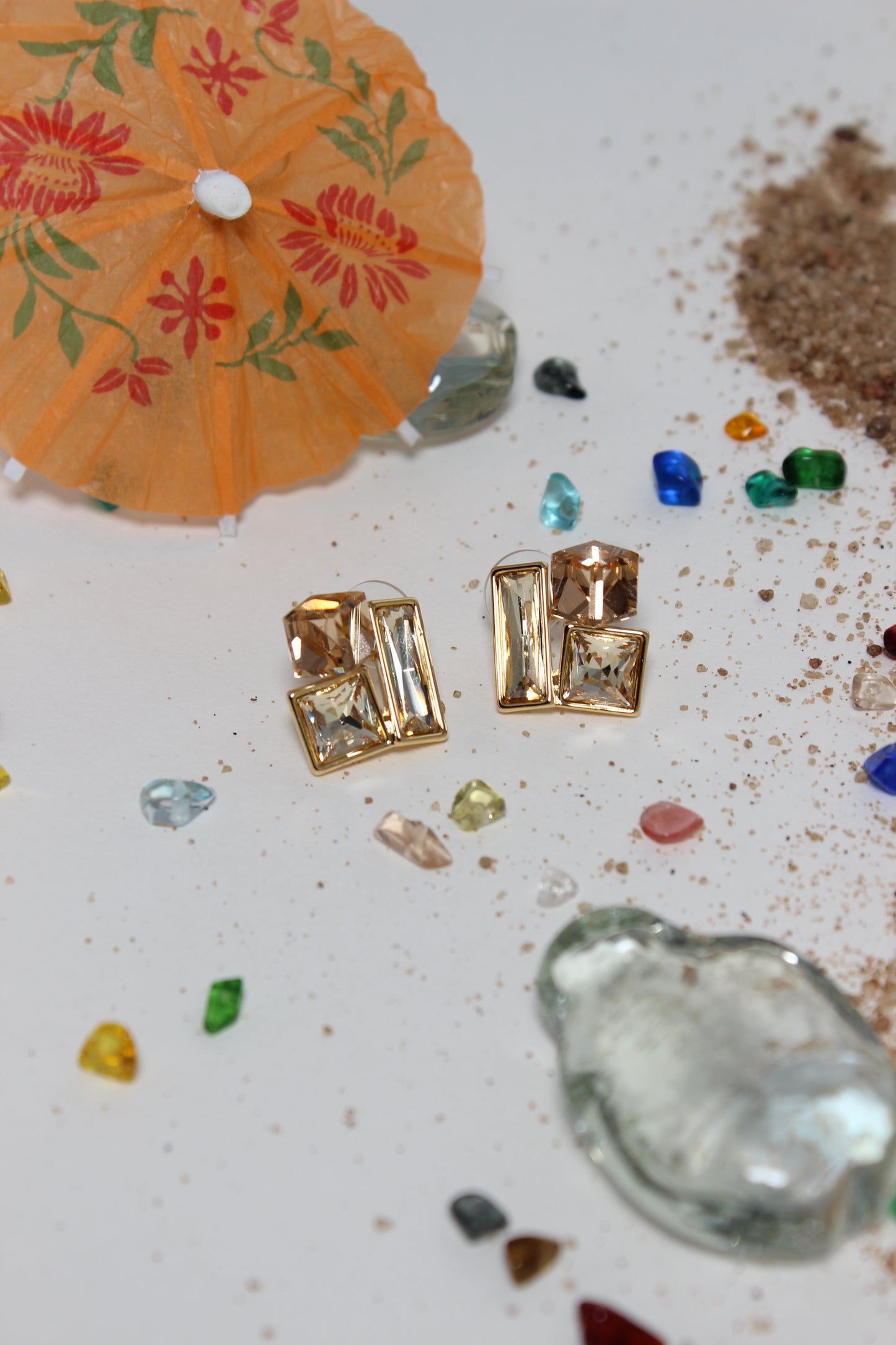 Copper Glow Earrings on a textured surface