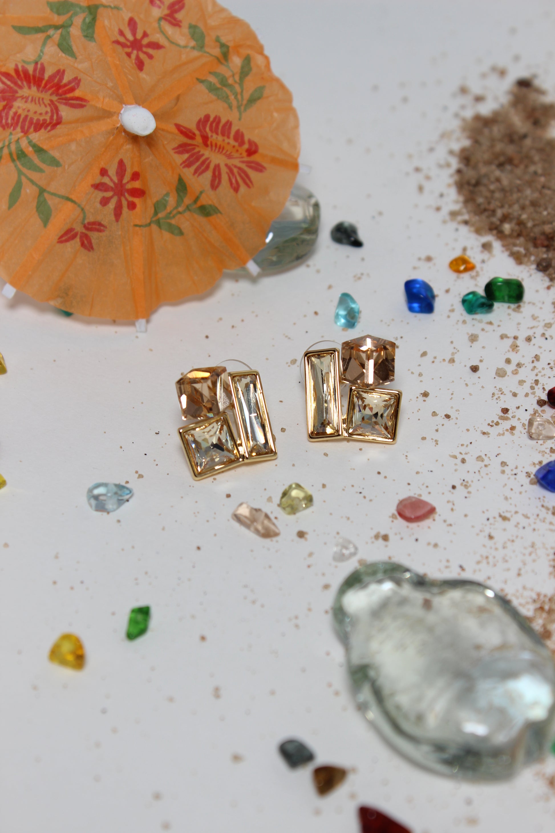 Copper Glow Earrings on a textured surface