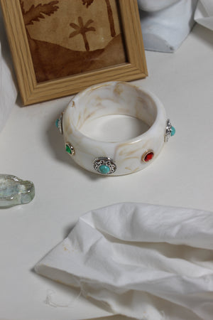 Soleil Bangle on a white surface