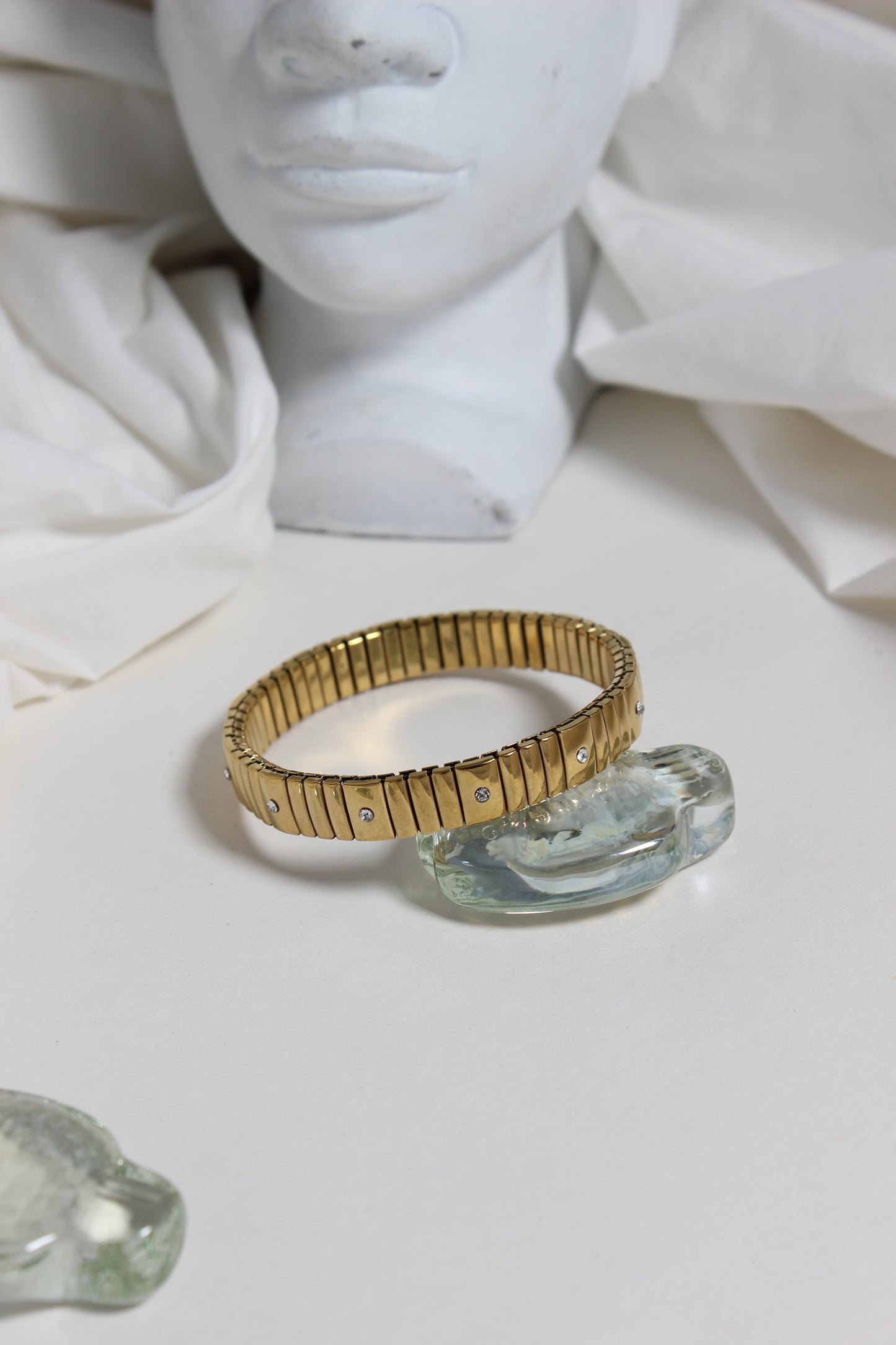 Midnight Spark Bracelet with a clear gemstone on a white background