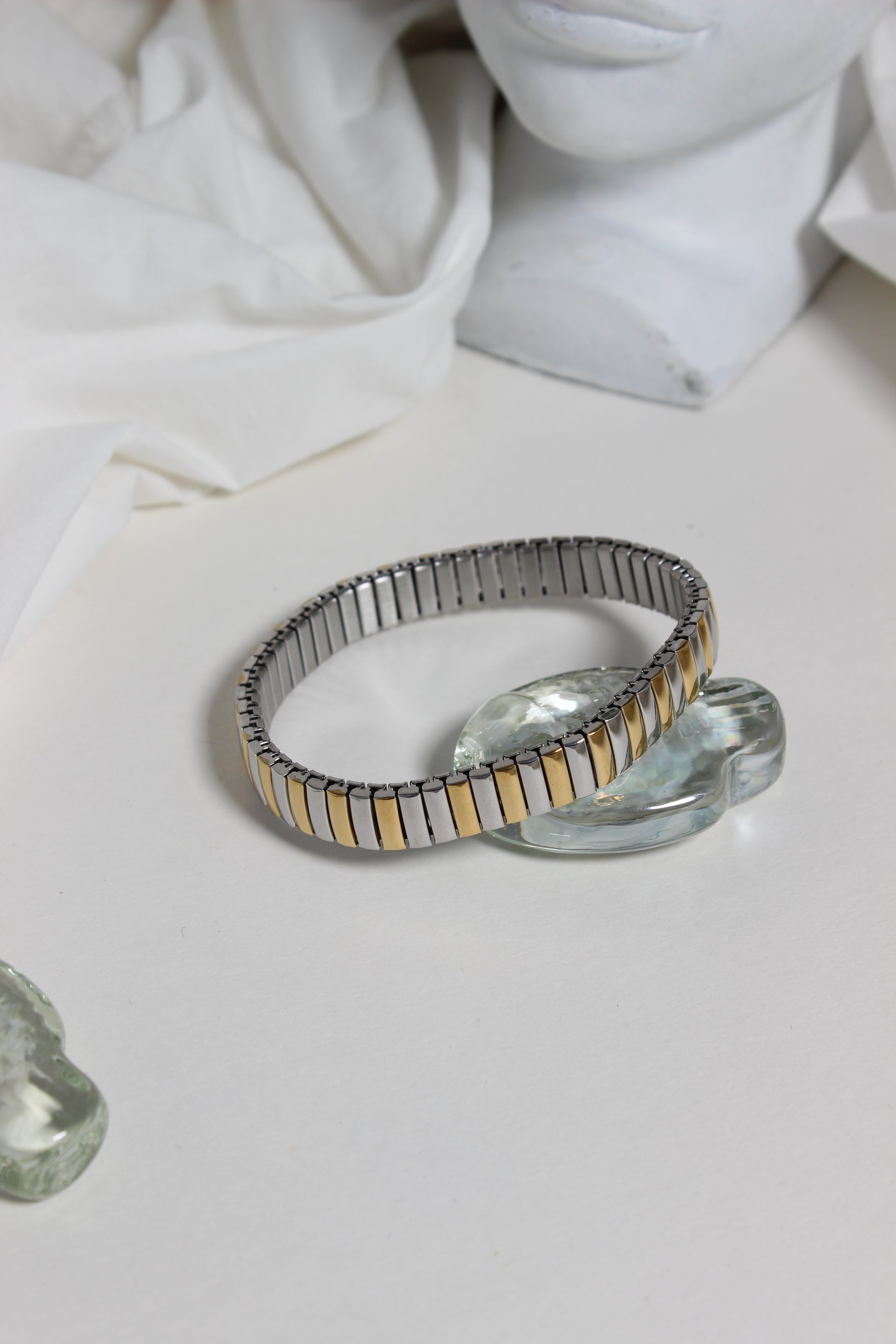 Equinox Bracelet on a white marble surface