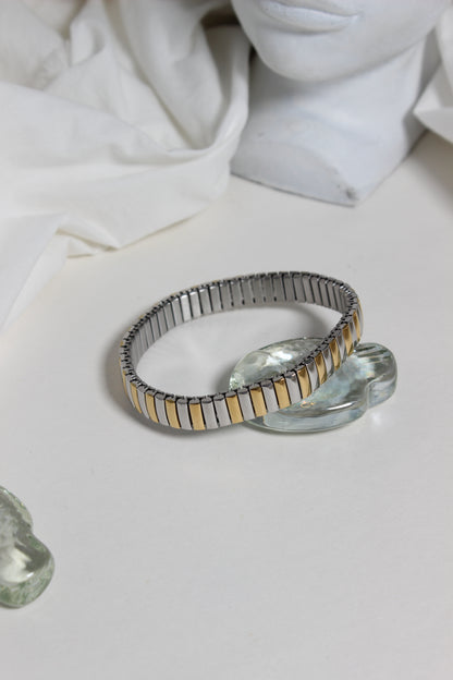 Equinox Bracelet on a white marble surface