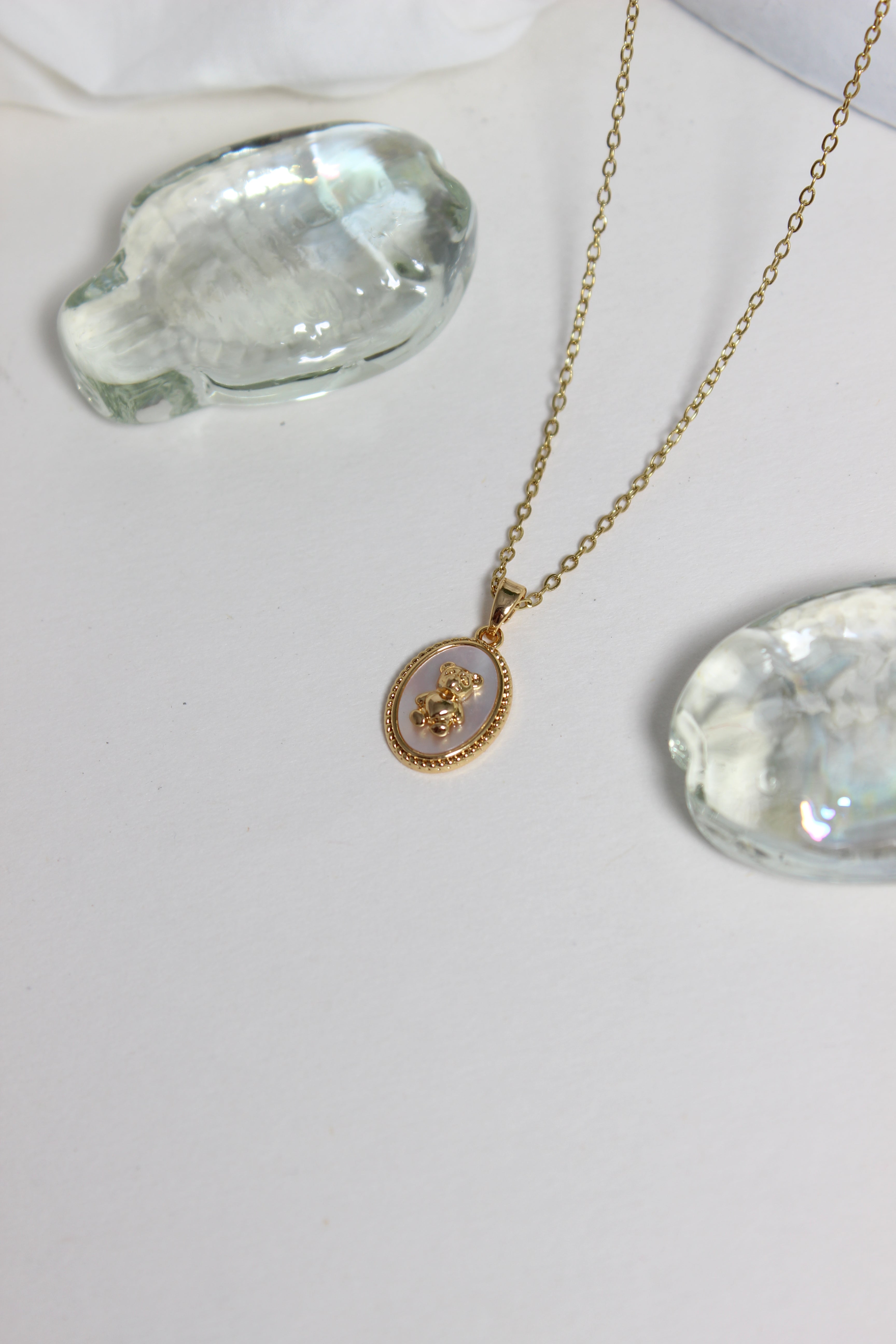 Cuddle Pearl Pendant Necklace on a white surface