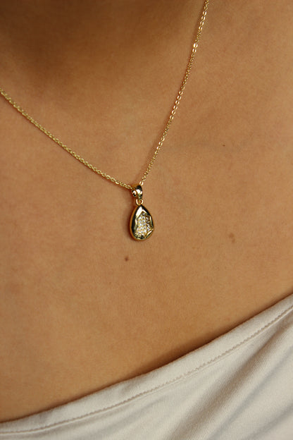 Glow Within Pendant Necklace on a model's neck